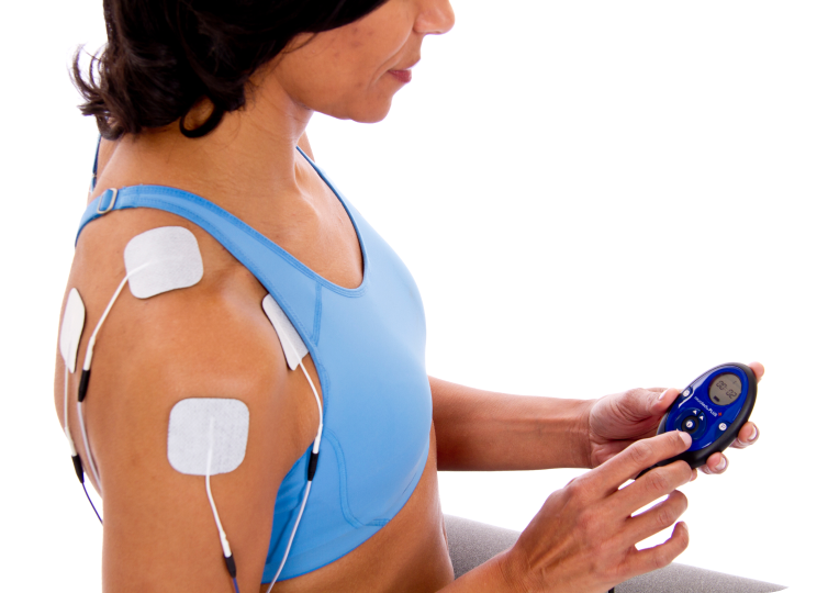 Patient using the Neurotech Plus device on her right shoulder.